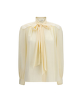 Chloé – Blusa Avorio con Fiocco al Collo e Ricami sulle Spalle