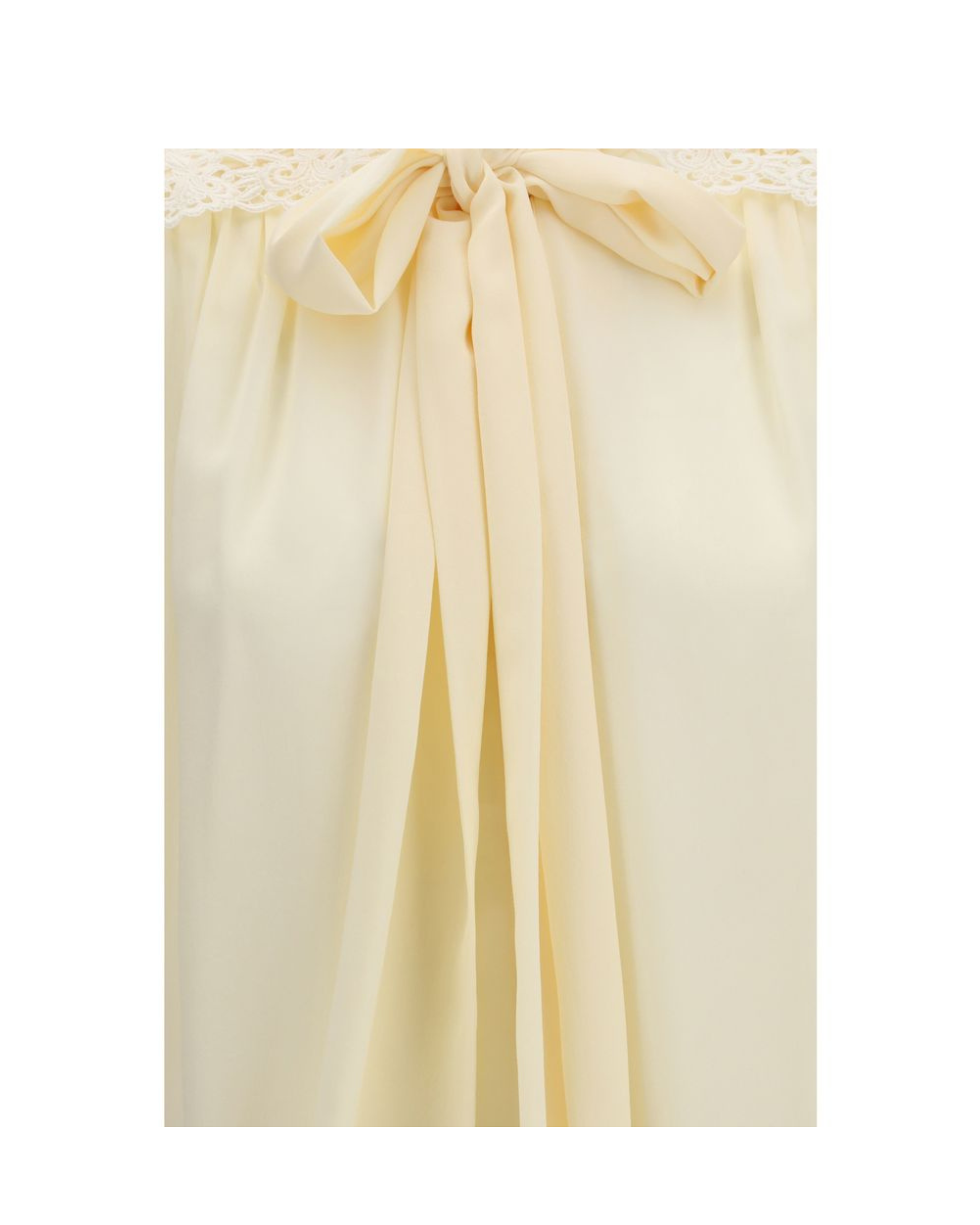 Chloé – Blusa Avorio con Fiocco al Collo e Ricami sulle Spalle