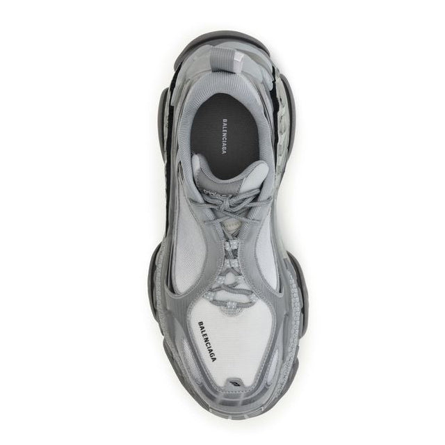Balenciaga – Triple S Sneakers Grigio e Bianco dal Look Distressed