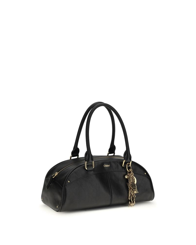 Chloé – Bowling Bag in Pelle Nera con Charm Dorati